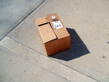 image of a cardboard box on the sidewalk