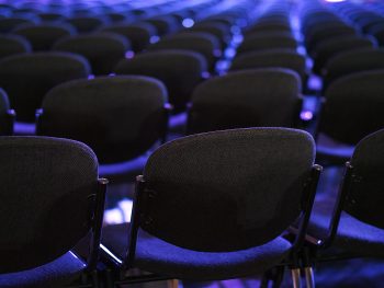 Rows of purple auditorium seats